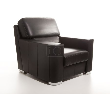 A studio shot of a leather black armchair isolated on white back
