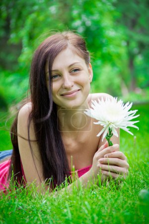 Brunette with a flower