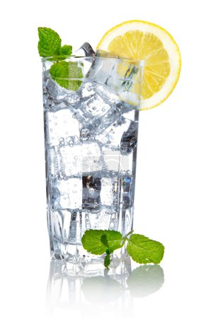 Glass of fresh cool water with lemon