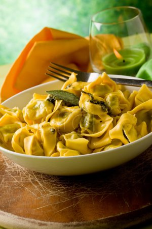 Tortellini with Butter and Sage with green background