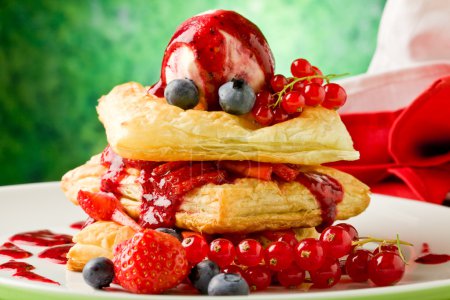 Puff pastry with berries and ice cream