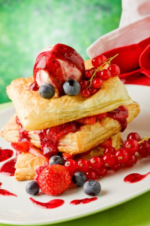 Puff pastry with berries and ice cream