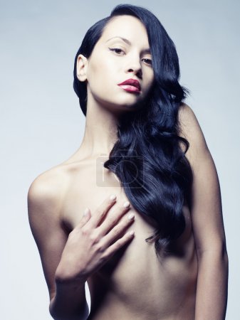 Beautiful nude woman with long hair