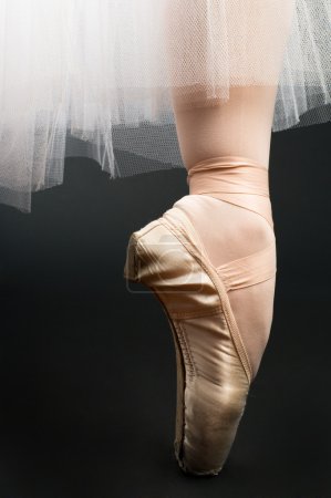 Legs in ballet shoes