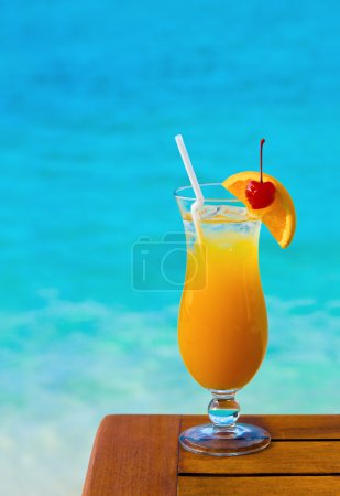 Orange cocktail on table
