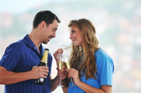 Happy couple with glasses of champagne