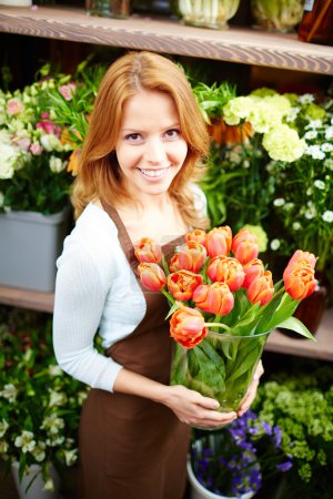 Florist with red tulips