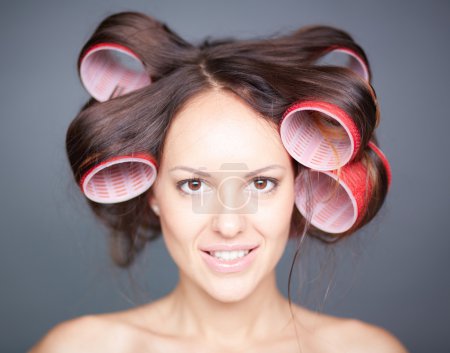 Woman with big hair-rollers