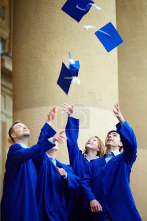 Students throwing their hats
