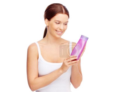 Woman holding body lotion