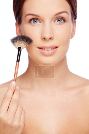 Girl with touch of powder brush