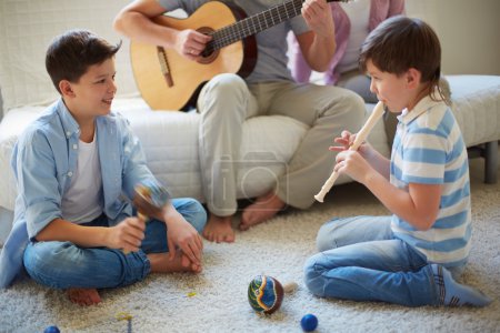 Family playing musical instruments