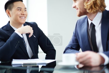 Entrepreneurs interacting at meeting