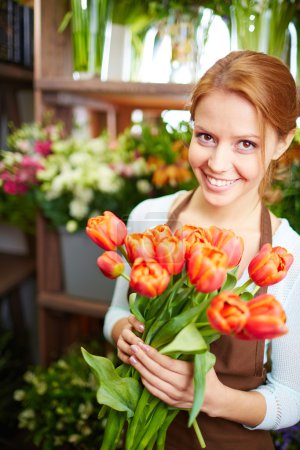 Florist with red tulips