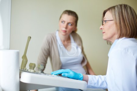Woman undergoing regular examination at hospital