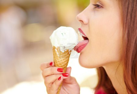 Girl enjoying  ice-cream