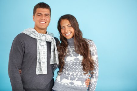 Couple in fashionable pullovers