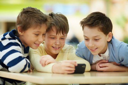 Children with smartphone