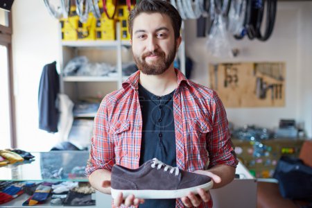 Man selling footwear