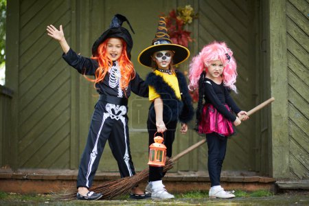 Halloween girls on broom