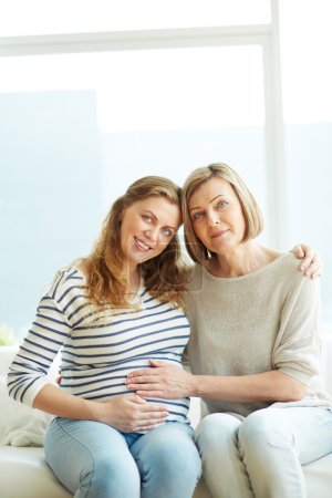 Pregnant woman and her mother