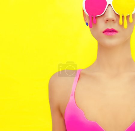 bright girl in exclusive colorful glasses