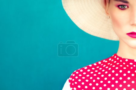 close-up portrait of retro girl on the blue background