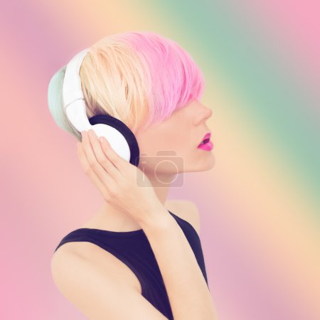 Sensual girl in stylish headphones