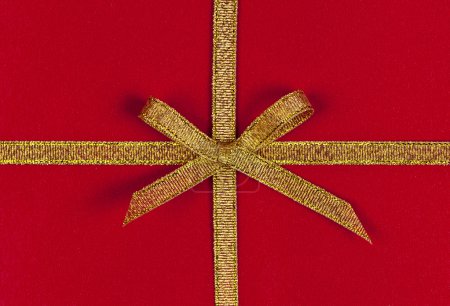 Red gift with gold ribbon