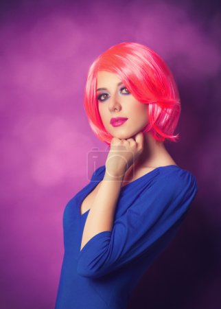 Young girl on purple background