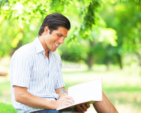 Young student with note at outdoor