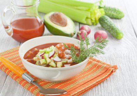 Cold soup with shrimp, vegetables and tomato juice