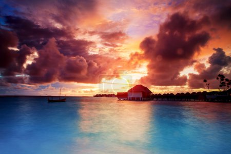 Sunset over Maldives islands