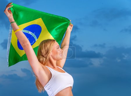 Happy fan of Brazilian football team