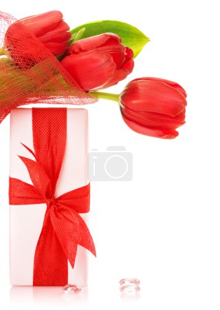 Red tulip bouquet with present