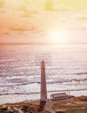 Lighthouse on seashore