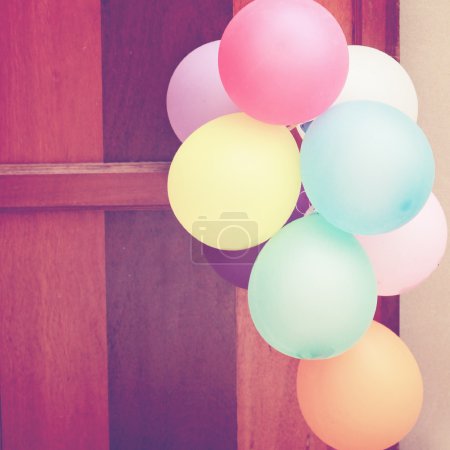 Balloons hanging on door