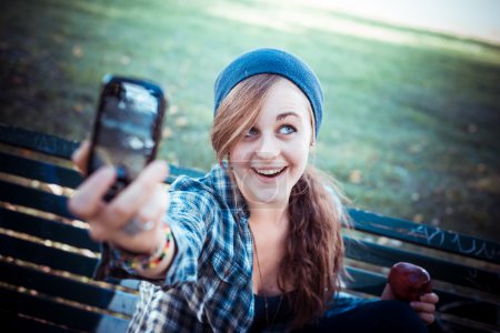 beautiful young blonde hipster woman selfie