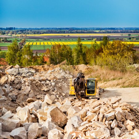 Excavator in quarry