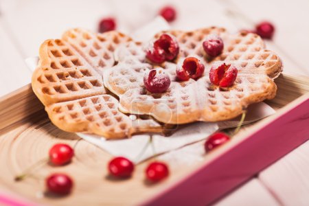Sweet waffles with cherry