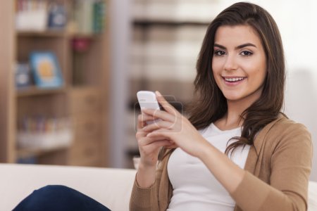 Woman writing text message