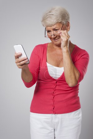 Senior woman using mobile phone