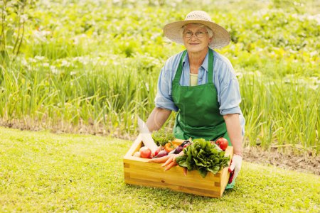 Senior woman with vegetable