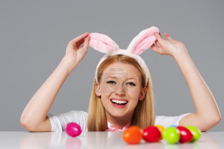 Laughing easter bunny woman