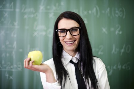 Beautiful student with apple