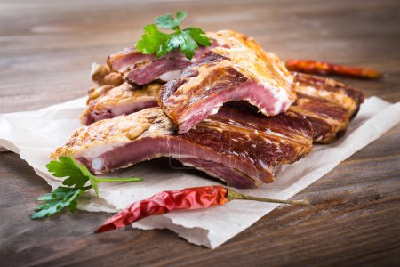 Smoked ribs with parsley leaves