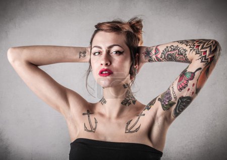 Beautiful alternative woman with tattoos