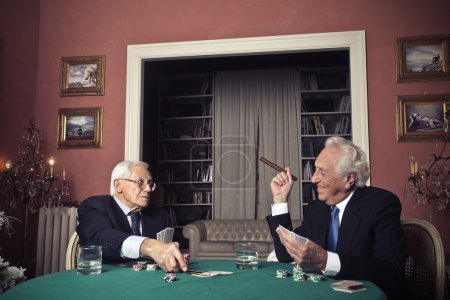 Old men playing poker