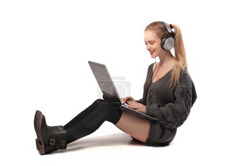 Blonde Girl Using her Laptop Computer