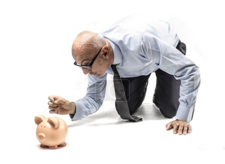 Businessman with a piggy-bank